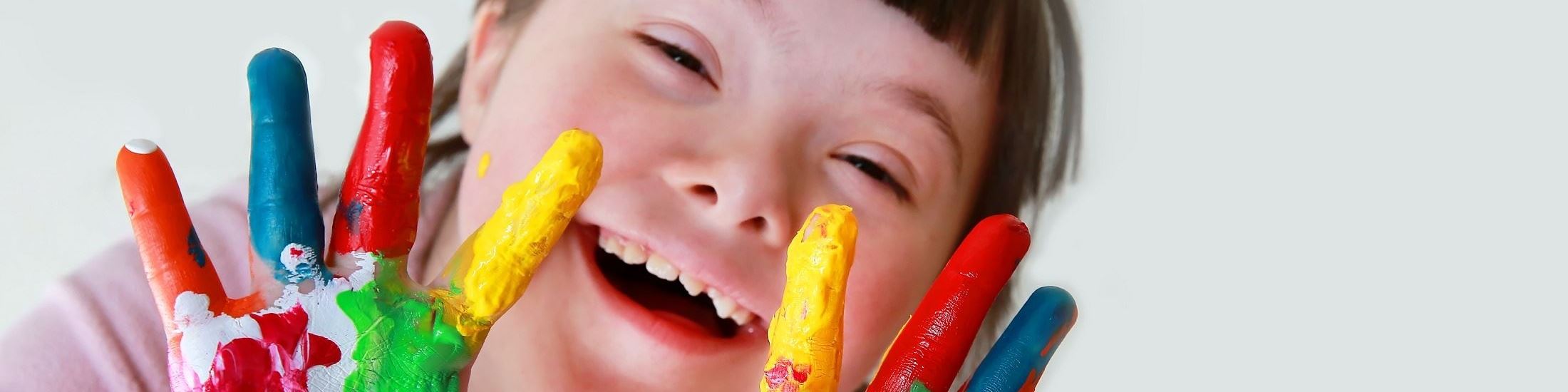 Girl finger painting